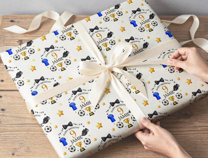Section of the personalised football wrapping paper showing the football print and personalisation