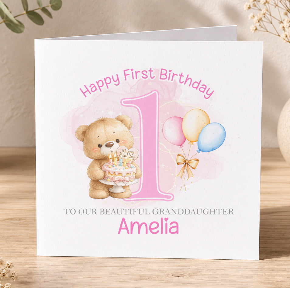 Personalised birthday card for Amelia, featuring a teddy bear holding a birthday cake and balloons, with the text Happy First Birthday to our beautiful Granddaughter Amelia.