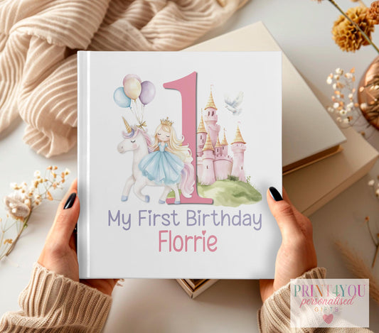 Personalised unicorn princess baby photo album with pastel pink cover, castle and balloon design, and custom name