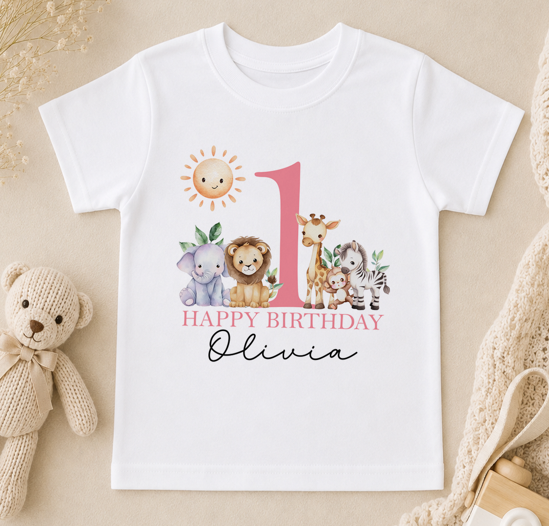 Personalised white t-shirt printed with a sun, giraffe, lion and zebra and 'Happy Birthday Olivia'.