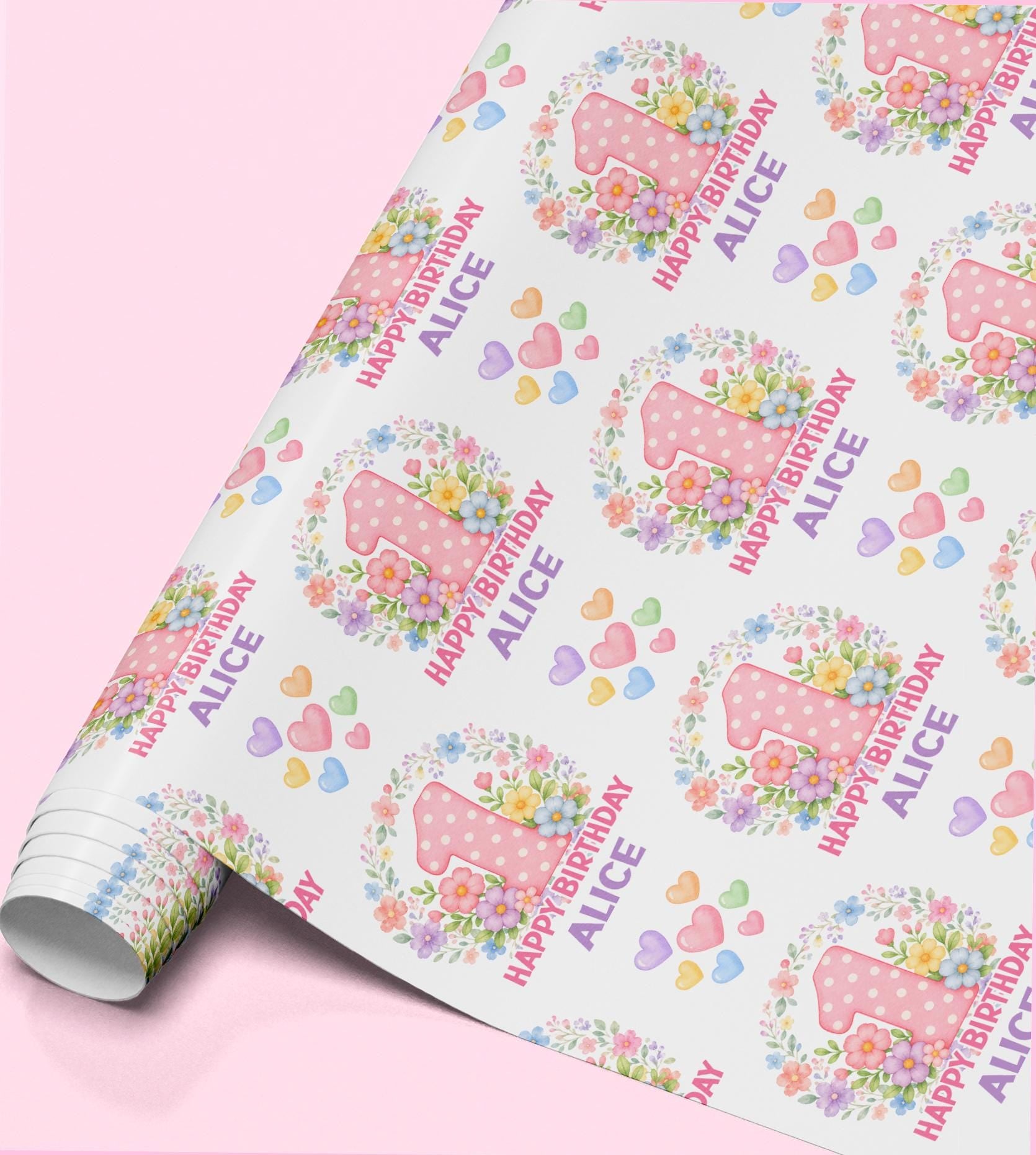 Personalised floral number birthday wrapping paper featuring a large pink floral age number, custom name, colourful flowers and pastel hearts.