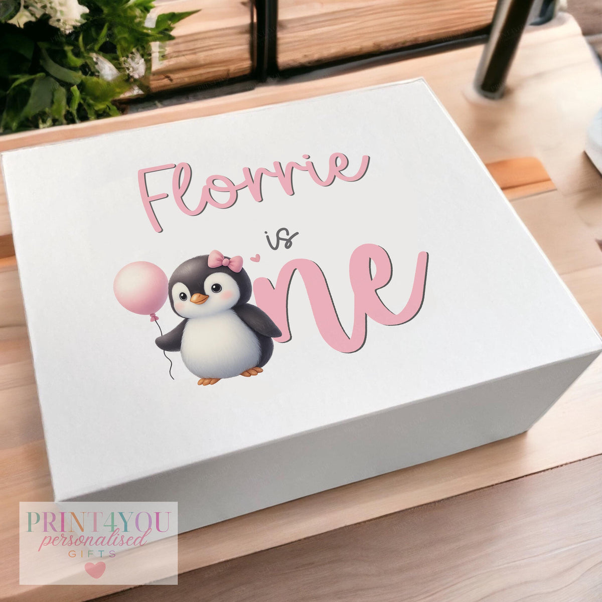 Penguin-themed personalised keepsake box printed with a baby girl's name