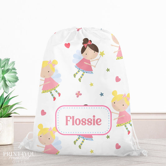 Personalised pastel fairy drawstring bag with wings, stars and hearts, printed with a custom name on the front