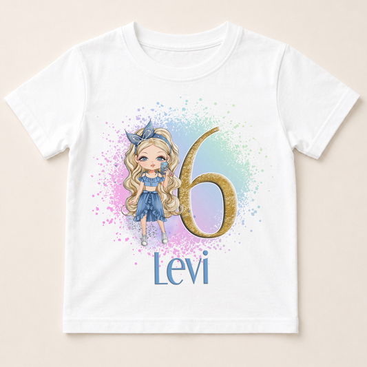 A white t-shirt with a graphic design featuring a blonde girl with blue hair and a gold number 6, along with the text " Levi 6" below the number.