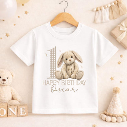 Personalised 1st birthday bunny outfit set laid flat showing vest and bib