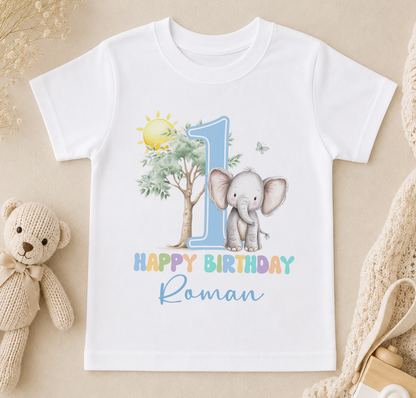 A white t-shirt with a colorful graphic design featuring an elephant and the number 1, along with the text "Happy Birthday Roman".
