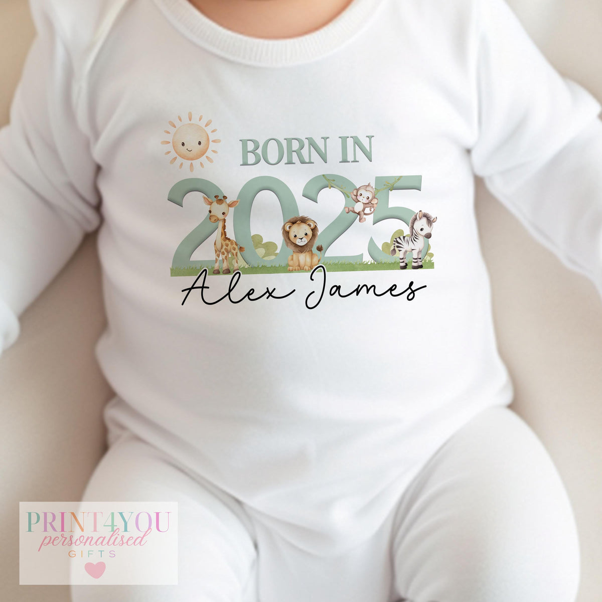 Personalised safari baby vest laid flat, soft 100% cotton newborn outfit.