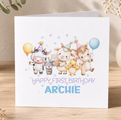 First birthday card for a grandson featuring cartoon farm animals – a cow, pig, chicken and duck – with balloons and the personalised message 'Happy First Birthday Archie'.