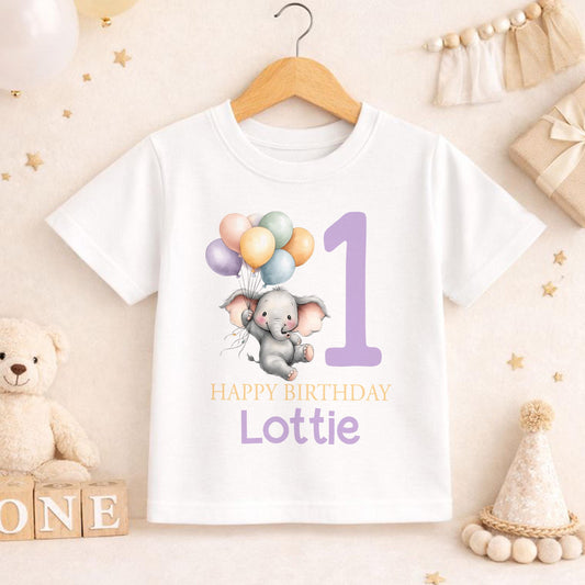Personalised elephant with balloons 1st birthday outfit laid flat, showing the full range of styles available