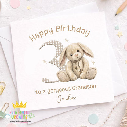 Front view of the beige bunny personalised birthday card on a plain background.