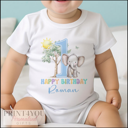 Personalised blue elephant first birthday bib, printed with your baby boy's name in soft blue script.