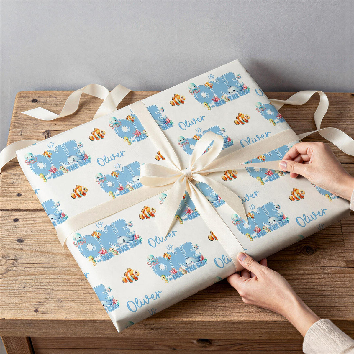 Gift wrapped in personalised under the sea wrapping paper