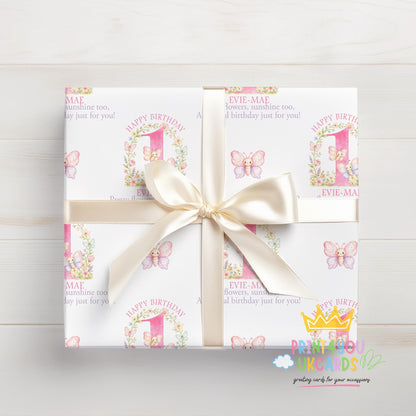 Gift wrapped in the personalised pink butterfly wrapping paper, tied with ribbon.