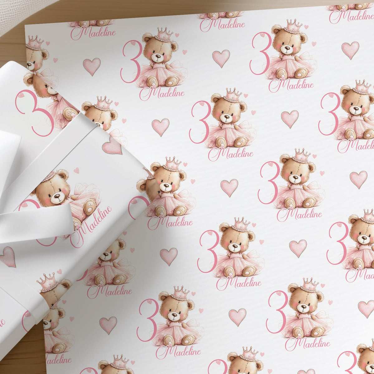 Roll of personalised pink teddy bear 1st birthday wrapping paper printed with a name
