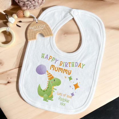 Baby wearing the personalised party dinosaur 'Happy Birthday Daddy' vest