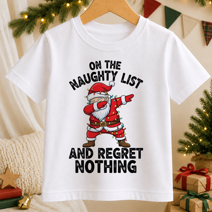 A white t-shirt with a graphic design of Santa Claus and the text "ON THE NAUGHTY LIST AND REGRET NOTHING" printed on it.
