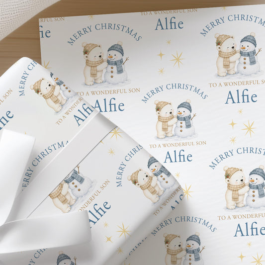 Personalised Christmas wrapping paper featuring a cute polar bear with a snowman, custom name and relation Christmas gift wrap.