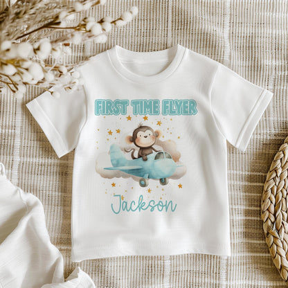 Personalised monkey and aeroplane bib, printed with the baby's name for their first flight.