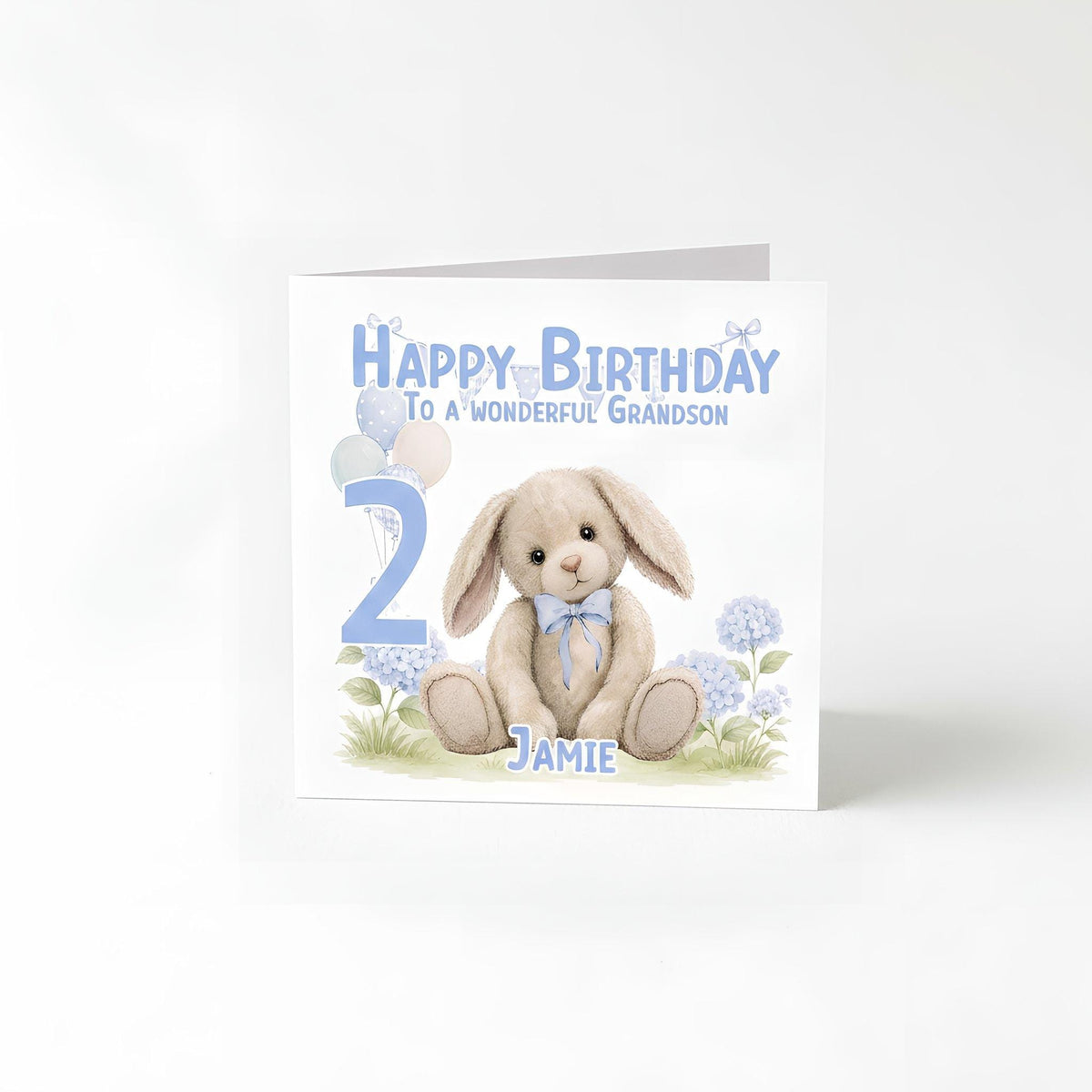 Personalised blue bunny 2nd birthday card shown with its matching envelope