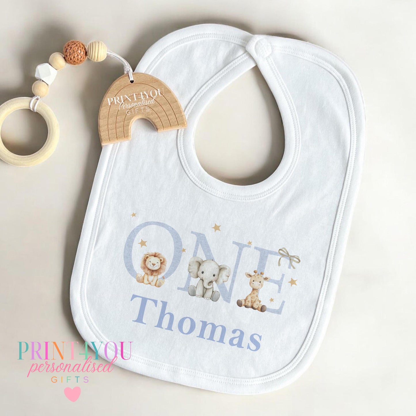Baby wearing a personalised jungle safari first birthday bodysuit with a custom name printed on soft cotton.
