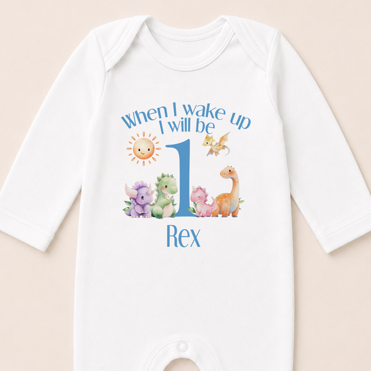 Personalised blue dinosaur first birthday vest with baby's name and 'When I Wake Up I Will Be One' print.