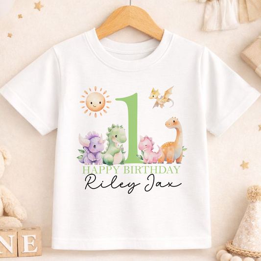 Personalised green dinosaur first birthday t-shirt printed with a number one and baby's name.