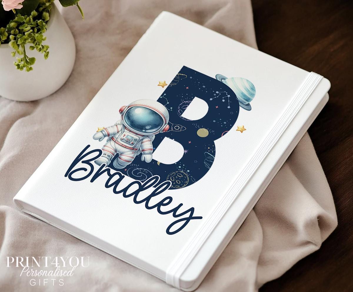 Personalised kids galaxy themed space journal, PU leather notebook with astronaut design