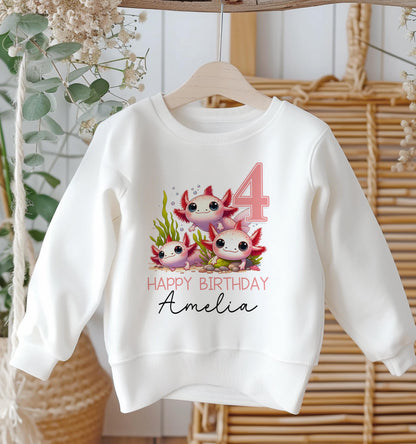 Personalised white cotton sweatshirt with cute axolotl design, custom name and birthday age, baby size 6-12 months
