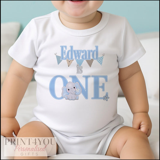 Personalised Blue Elephant first birthday bib printed with baby's name and the cuddly elephant design.