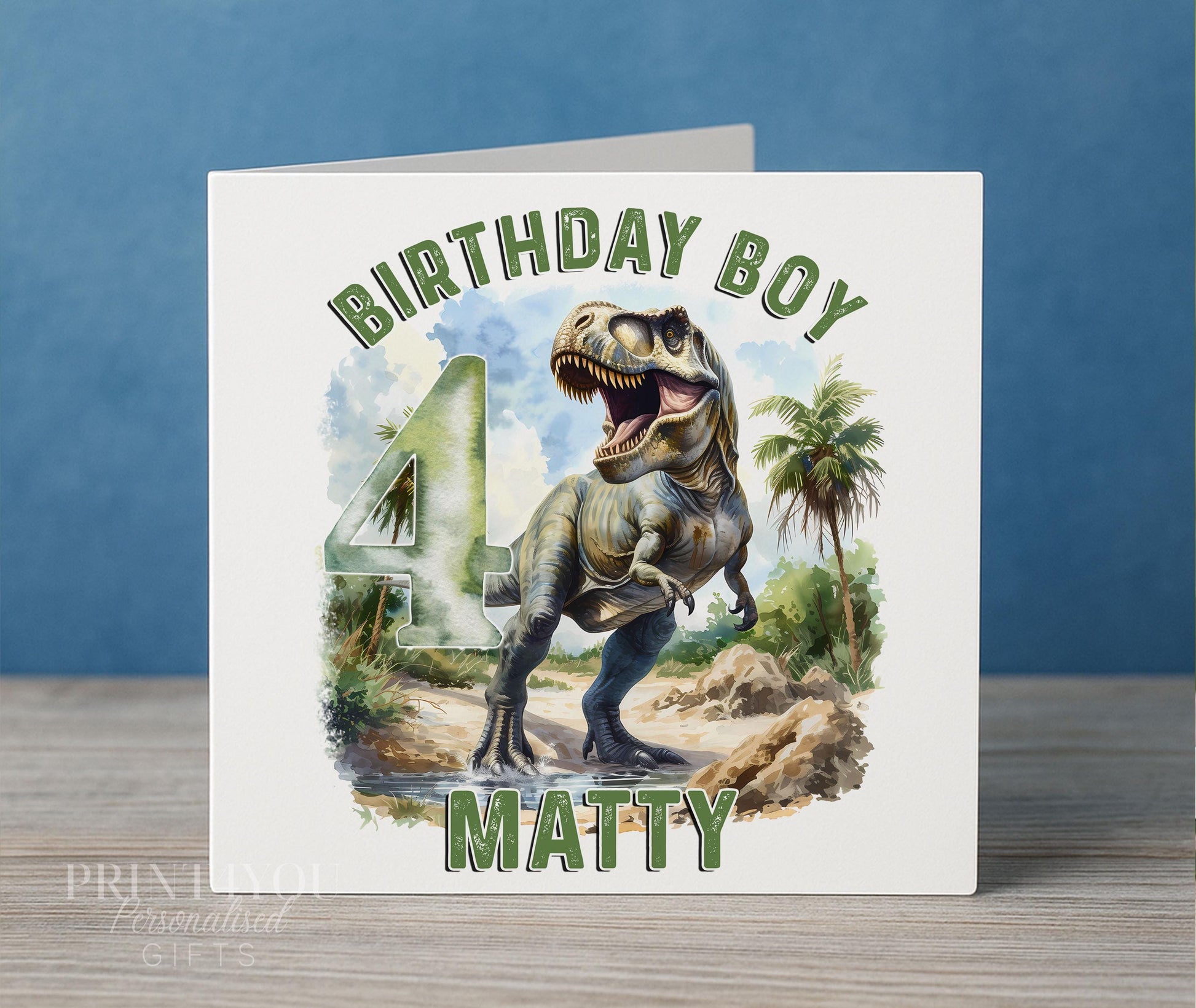 Personalised dinosaur birthday card, white 6x6 inch square card printed with Birthday Boy, a T-Rex, a large age number and a name
