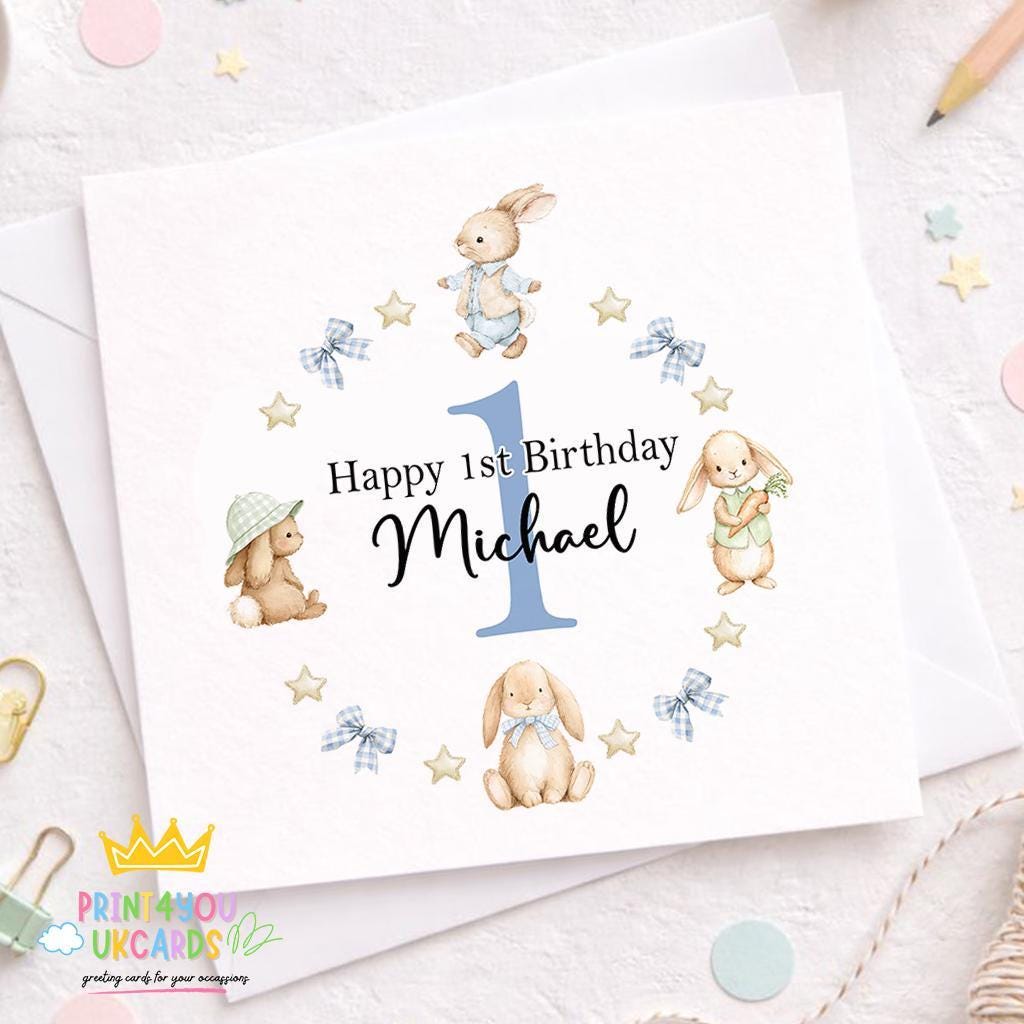 Square 1st birthday card featuring a blue bunny wreath design personalised with a baby boy's name