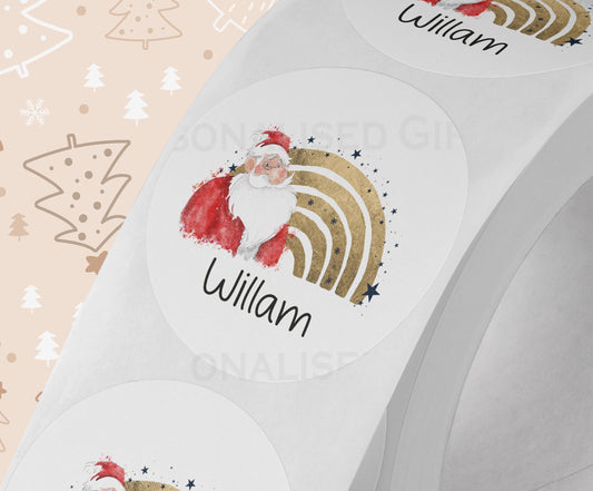 Personalised Santa rainbow Christmas sticker with custom name, colourful glossy white 5cm round label strip