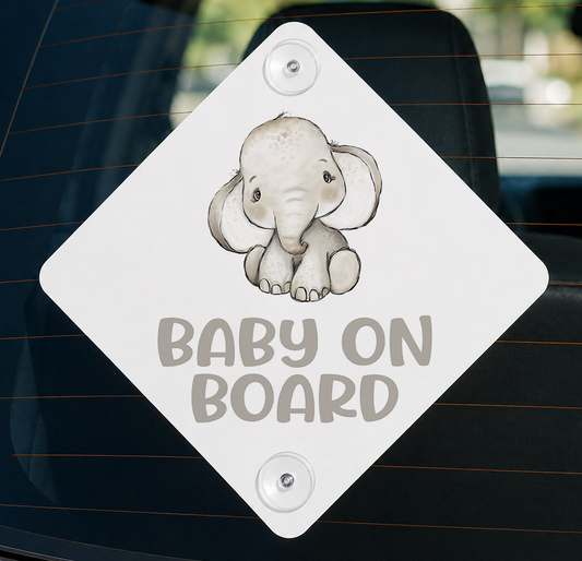 Aluminium car window sign printed with a baby elephant safari design and the words 'Baby on Board'.