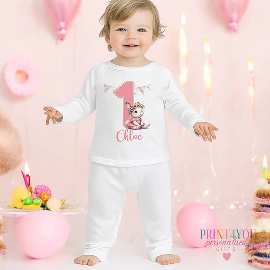 Ballerina bunny personalised first birthday pyjamas for 6-12 months, printed with baby's name on soft white cotton.