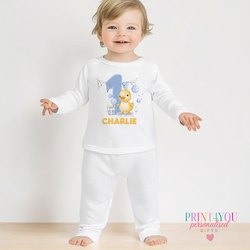 Yellow duck and bubbles personalised first birthday pyjamas for 1-2 years, printed with baby's name on soft white cotton.