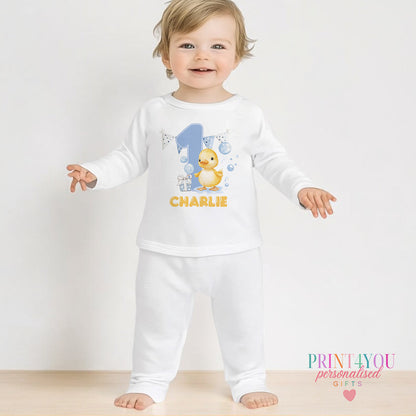 Yellow duck and bubbles personalised first birthday pyjamas for 1-2 years, printed with baby's name on soft white cotton.