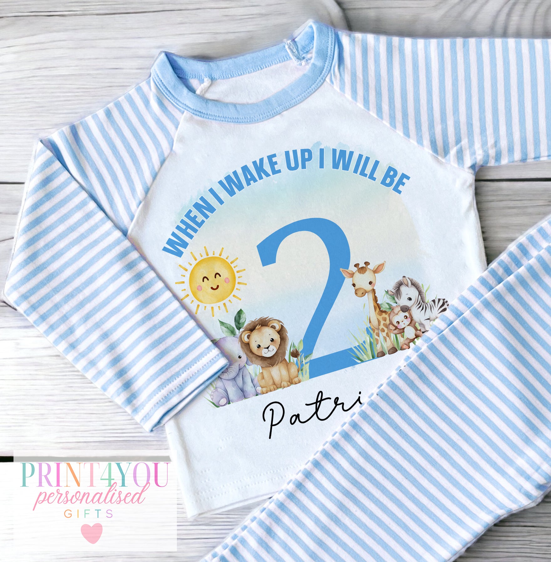 Personalised blue and white striped boys pyjamas with safari jungle animals when I wake up design