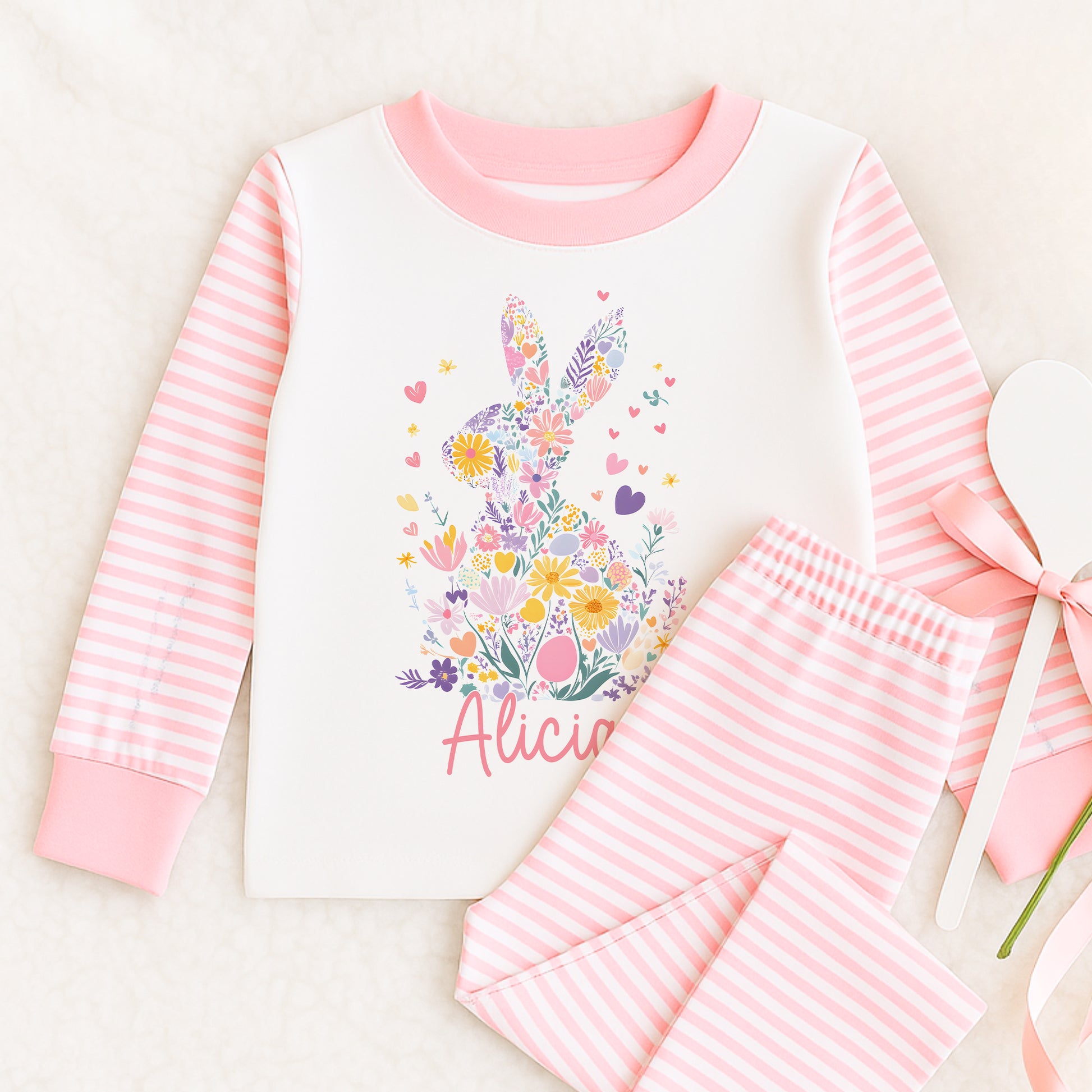 Personalised pink striped pyjamas for girls with floral bunny rabbit design, size 6-12 months