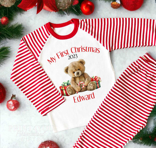 Personalised My First Christmas teddy bear pyjamas with a baby's name on red and white striped nightwear