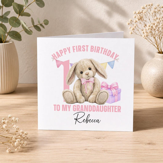 Square personalised first birthday card featuring a pink bunny design for a baby girl's first birthday.