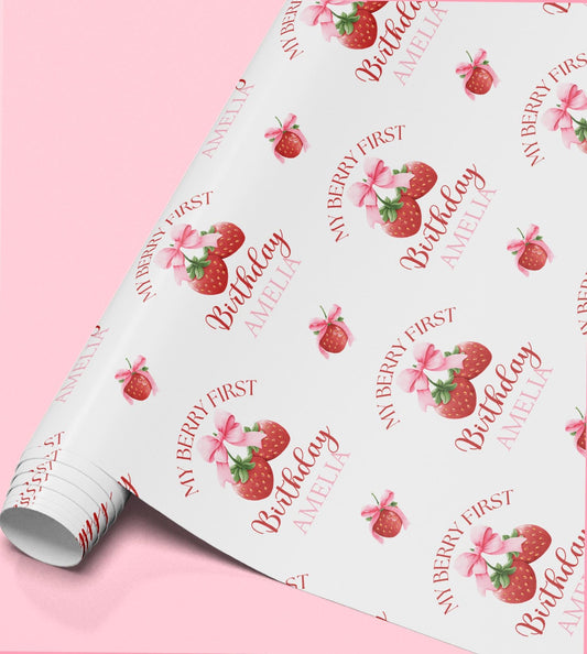 a repeating pattern of strawberries and bows on a white background.