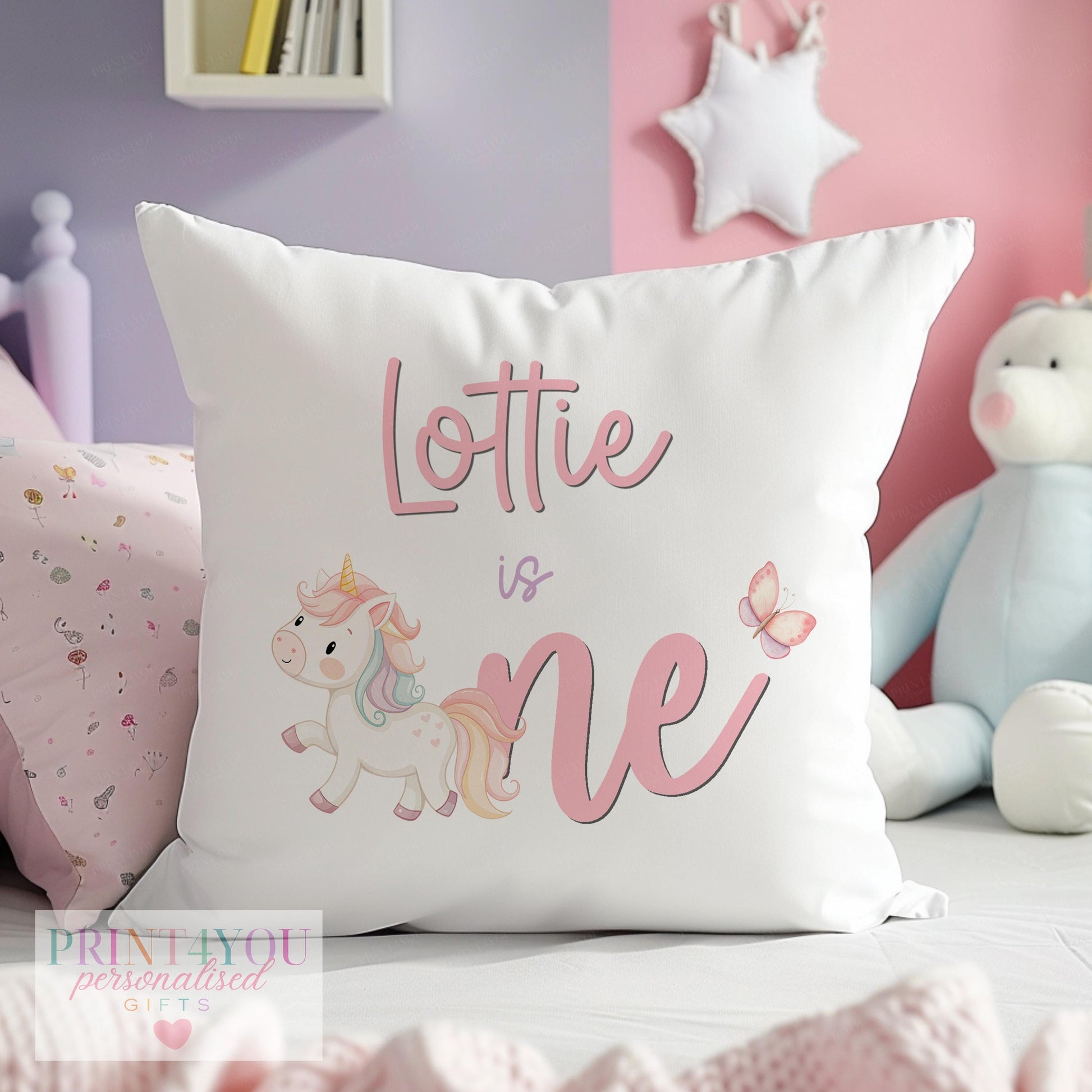 Personalised pink unicorn 1st birthday cushion with custom baby name, shown as the cushion cover only