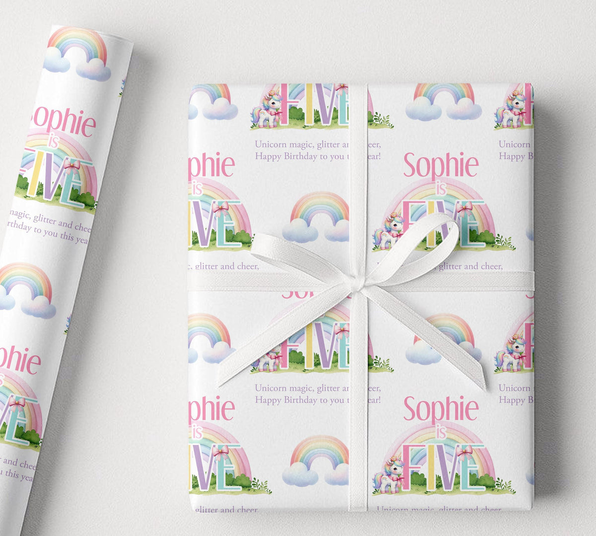 Personalised birthday wrapping paper with rainbow unicorn design, custom name and age, pastel colours, clouds and magical birthday wording.