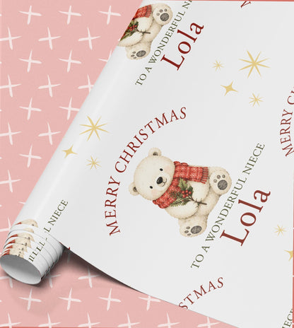 Personalised polar bear Christmas wrapping paper shown wrapped around a gift box to demonstrate the finished look.