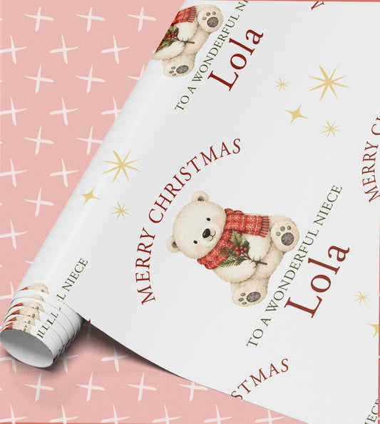 Personalised polar bear Christmas wrapping paper shown wrapped around a gift box to demonstrate the finished look.