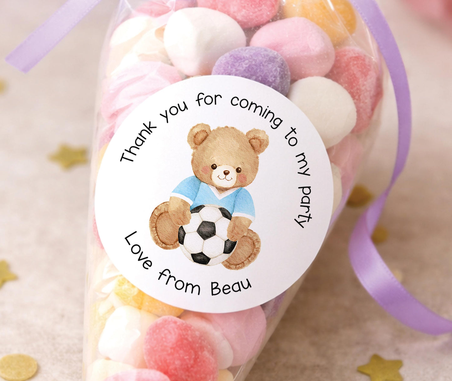 Glossy round personalised football teddy bear stickers, printed with a child's name for boy's birthday party bags