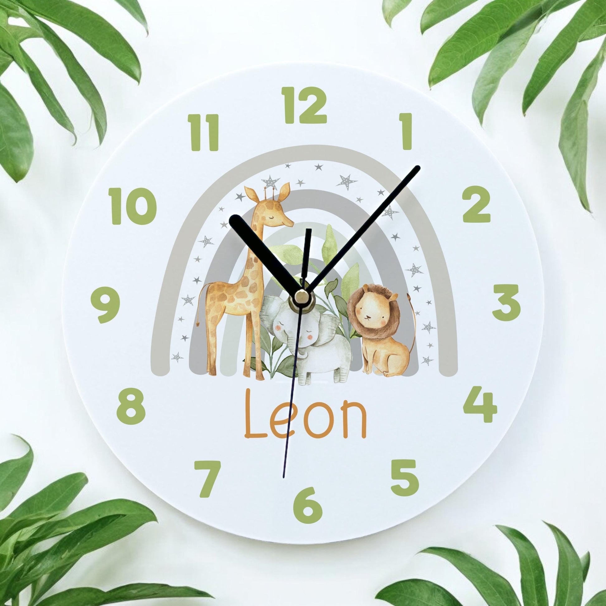Personalised grey safari animals acrylic clock displayed on a child's bedroom wall