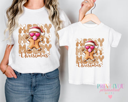 Baby wearing a personalised matching mummy and me Christmas t-shirt with custom name printed on the front, 0-3 months