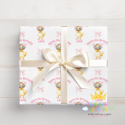 An additional close-up of the sunglasses duck pattern and pink birthday design on the wrapping paper