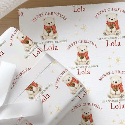 Personalised Christmas wrapping paper featuring a friendly polar bear with holly and a festive red scarf, custom name and relation.